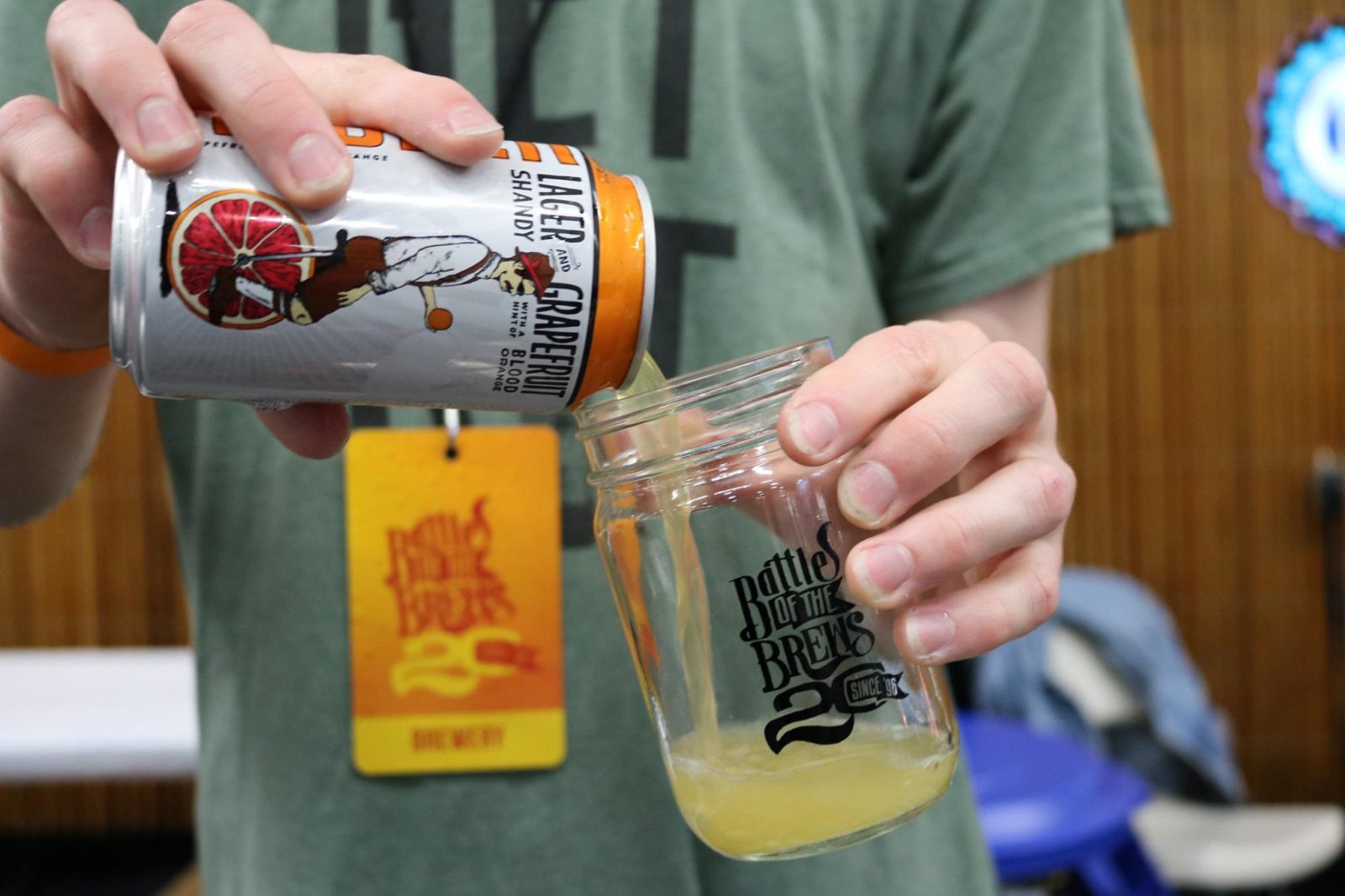 Man pouring beer from can